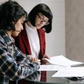 South African family reviewing finances to protect assets during debt review
