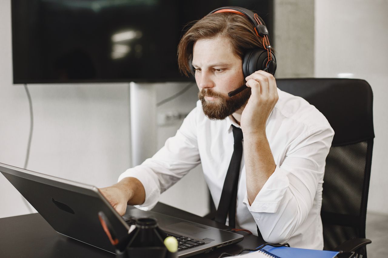 Business professionals reviewing digital document management solutions
